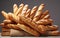 A Variety of French Breads on a Gray Background in the Picture. Generative AI