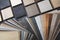 Variety of furniture and flooring material samples for interior design