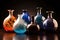 variety of hand-blown glass vases