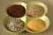 Variety of healthy grains and seeds in bowl: buckwheat, oatmeal, rice, corn