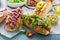 Variety of hot dogs with healthy garnishes