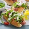 Variety of hot dogs with healthy garnishes