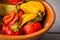 Variety of hot peppers in a bowl.