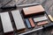 A variety of knife sharpeners. Sharpening stones and devices on a wooden background. Grinding stones