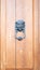 variety of knockers and handles on ancient doors in Italy. Old metal door handle on a wooden door. Art work