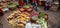 A variety of local vegetables and fruits in a daily market at Nansa, Yunnan, China. Winter fruits and vegetables