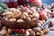 Variety of nuts with shells in a bowl