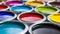 Variety of open paint cans displayed on a vibrant and diverse range of colorful backgrounds