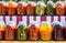 Variety of preserved fruits and vegetables in jars