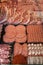 Variety Of Raw Meat - Kebabs Of Minced Meat, Beef Patties, Pork Skewers,Kebabs Wrapped In Bacon, Sausages At The Market Place