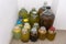 Variety of refreshing barley drink kvass in glass jars and bottles in cold basement of the house