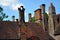 Variety of rooftop chimneys of Bruges building