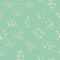 Variety of soft yellow paint spatters in random layout. Sunny seamless vector pattern on light turquoise background