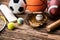 Variety Of Sport Accessories On Wooden Surface