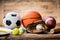 Variety Of Sport Accessories On Wooden Surface