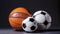 A variety of sports balls including a basketball, soccer ball, and futsal ball