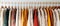 Variety Of Stylish Garments Displayed On Retail Clothing Rack