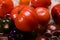 Variety of tasty ripe french tomatoes in wooden boxes on farmers market in Provence in summer