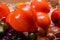 Variety of tasty ripe french tomatoes in wooden boxes on farmers market in Provence in summer