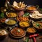 Variety traditional Indian dishes on the wooden table, selection of assorted spicy food