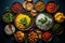 Variety traditional Indian dishes on the wooden table, selection of assorted spicy food, top view