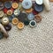 Variety of Vintage Buttons on Fabric Background