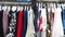 A variety of women's clothing on a hanger in the store