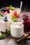 Variety of yogurts in portion glass jars. Healthy summer breakfast concept AI generated