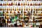 Various alcohol bottles in a bar, strong blur