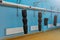 Various boxing bags in an empty gym. Selective focus with blurred background