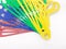 Various Bright Colorful Plastic Hanger for Clothes Drying Room Appliances in White Isolated Background 06