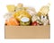 Various canned food, pasta and cereals in a cardboard box