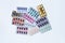 Various capsule medicines, pills and tablets in blister pack on white