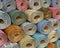 Various carpet rolls stacked one on another,