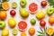 Various citrus fruits background mix flat lay, healthy vegetarian organic food