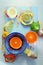 Various citrus fruits on blue cutting board