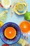 Various citrus fruits and ginger on blue cutting board