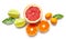 Various citrus fruits on white background