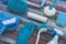 Various cleaning tools placed on a colorful table