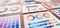 Various color palette idea papers arranged on workspace for designer. Scrutinize