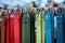 Various colored belts in the craft market. - image