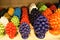 Various colored porcelain pine cones to promote the region Sicily in Italy