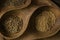 Various colorful herbs and spices on wooden table  isolated on black background. mustard  rosemary  cumin  coriander  anise