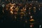 Various colorful Krathong floating with candles in lake in Benjasiri park in Bangkok