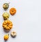 Various colorful little pumpkin on light background. Fall composing with pumpkin,top view