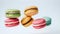 Various colorful of macarons floating on the air isolated on clean png background, Desserts sweet cake