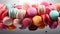 Various colorful macarons floating on the air isolated on clean png background, Desserts sweet cake concept