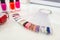 Various colorful nails, manicure palette. Nail polish samples. selective focus