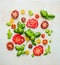 Various of colorful sliced tomatoes with basil leaves