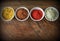 Various colorful spices on wooden table. Top view